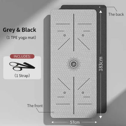 Eco-friendly grey & black TPE yoga mat with strap included, measuring 183cm by 57cm. Perfect for self-care, fitness routines, and relaxation! 🧘‍♂️🏋️‍♀️